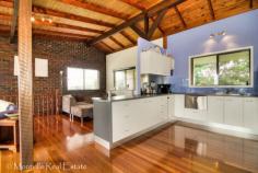  1 Falcon Court Mapleton Qld 4560     $478,000 	 Quietly nestled in a private leafy cul-de-sac is this home with character and appeal.  On the upper level the home opens up into a generous area that accommodates the kitchen, family and dining rooms. This provides a spacious, open plan living area with a pleasing north-east aspect. Across the room a high, vaulted ceiling enhances its spacious look and the living space is warmed by hardwood floorboards. This is a pleasant, light-filled family room creating a user-friendly entertaining area.  The modern galley-style kitchen is part of the spacious living area allowing family and friends to never miss any of the activities whilst preparing scrumptious meals. Winters are well catered for with the combustion stove in the lounge area. With three good sized bedrooms including an air conditioned master bedroom, there is plenty of room for all. The bathroom is more than generous and well-appointed and there is a separate WC for convenience. The ground floor level accommodates a generous double garage, laundry, bathroom and a large, fully tiled rumpus room with external access that could be used as a home office or even a dependents private space. The downstairs patio, overlooking soothing, sun-dappled gardens, sits atop a large rain water tank and the near level 809m2 parcel of land is very easy to maintain. The property is located in a prime position, ideal for a family, and so close to the village and a good selection of schools. Ideally set for living convenience, this is a must see home. Features Deck Smoke Alarms   	 Pot-belly stove Safety Switch Property Details Property Type: 	 House Bedrooms: 	 3 Bathrooms: 	 2 Garages: 	 2 Land Area: 	 809m2 