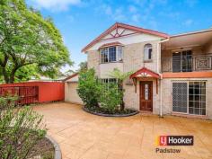  12/12 Turvey Street Padstow NSW 2211 Double Brick - Luxury & Space AUCTION: The Waratah Room, Revesby Workers Club - 2b Brett Street, Revesby REGISTRATION: From 6.00pm Quietly positioned and light filled throughout, this unique street facing double brick townhouse with its own private entry, presents an exciting opportunity for the first home buyer or investor. Boasting spacious formal and informal living areas, very well maintained interiors and secure side access to an entertainer's yard. Located only minutes to all Padstow amenities including choice of schools, shops, transport, parks and playing fields.  - 4 king sized bedrooms with built in robes + main bedroom with walk in robe & ensuite - Upstairs rumpus perfect for a kid's study area or home office  - Massive & open formal & informal lounge & dining areas  - Ducted air conditioning & vacuuming, security alarm system & down lights throughout - Timber kitchen with granite bench tops, stainless steel appliances & gas cooking  - Well maintained main bathroom tiled from floor to ceiling + separate shower & spa  - Separate internal laundry with external access + down stair's toilet for your convenience  - Entertainer's yard + automatic side access to a double carport + secure front car space - Excellent tenant of 8 years with an approximate rental return of $31,200p/a  - Minutes to all Padstow schools, shops, transport, parks and playing fields   Property Snapshot  Property Type: Townhouse 