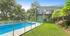  101 Woodland St S Balgowlah Heights NSW 2093 This quality architect designed home is only 6 years old and offers perfect family living on a level 730m2 block. The home has been designed to maximize the light and the vista of its leafy surrounds. The residence is set over two levels and has smart indoor/outdoor living and entertaining options connecting to the beautiful native gardens, level lawn area and the salt water swimming pool. The upper level features an expansive open plan kitchen - living - dining area that flows onto large entertaining terraces at either end of the house. The Eastern one has leafy district and water views spanning down to North Harbour while the other overlooks the impressive garden and pool. The kitchen is stunning with extensive storage space and quality European gas and electric appliances. The CaesarStone island bench allows friends somewhere to sit for a casual get together over a coffee or a glass of wine.  You won't ever feel the need to leave as upstairs has a cleverly designed home office with built-in desks, shelves and cupboards, where concealed sliding doors close off the space for complete privacy. The master suite has enough built-in wardrobe space to satisfy anyone and opens to the front terrace providing parents a quiet retreat. Upstairs also has a generous 4th bedroom with built-in wardrobe and easy access to the Western terrace.  The lower level provides a great separate zone for young children or teenagers. Two large bedrooms open out onto lush gardens with private views of the adjoining native reserve. The family room opens to the level lawn and pool area offering a superb space for children to play and party. There is also a music/yoga room and a huge laundry connecting directly to the garden and drying area. At the front of the house is a substantial storeroom to safely keep your family's bikes, surfboards and golf clubs. The location is excellent being close to local shops, schools, beaches, public transport and beautiful North Harbour. There are so many extra features that make this house stand out from the crowd that an inspection is a must if you are after a luxury home in the area. Inspect: Sat / Wed 10.15am -10.45am Auction: Saturday 18th April 2015 