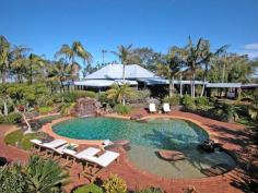  448 Old Byron Bay Rd Newrybar NSW 2479 For Sale: Offers Over $4.5M55 Luxury Coastal Byron Bay Estate One of Byron Bay's finest coastal estates. Situated on a stunning 6.3 acres(approx) parcel of land and only ten minutes to the beaches of Broken Head and Byron Bay is this beautiful private estate featuring spectacular ocean and valley views. A private driveway takes you past the stable area and horse arena and you then enter the main buildings. Featuring established gardens and sprawling lawns, a lagoon style pool with spa and waterfall creates a focal point for relaxation and entertainment and separates the main residence from the two luxury villas. This property is beautifully appointed with indoor outdoor living in mind. Approximate land area: 2.6 Hectares 