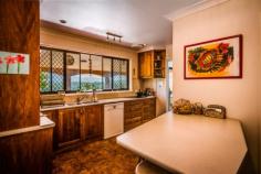  61 William St Bellingen NSW 2454 $545,000 Property ID 	 8837123 Bedrooms 	 4 Bathrooms 	 2 Garage 	 1 Land Size 	 588.10 m2 Balcony 	 Yes Broadband 	 Yes Built In Robes 	 Yes Courtyard 	 Yes deck 	 Yes Dishwasher 	 Yes Fully Fenced 	 Yes Hot Water Service 	 Yes Outdoor Ent 	 Yes Pay TV 	 Yes In Ground Pool 	 Yes Reverse Cycle 	 Yes Split System 	 Yes This 4 bedroom, 2 bathroom home set at the top of William Street is in one of Bellingen's most sought after positions with a perfect North East aspect and extensive mountain views. This property enjoys cool summer breezes, plenty of winter sun and is just 900m to the heart of Bellingen. With open plan living /dining, recently renovated kitchen, in ground pool and large covered deck it is an ideal Bellingen property.  As you climb William Street to this property you'll imagine the view when you get there will be spectacular and you won't be disappointed. Step through the front door into the carpeted living/dining area (9x5m) and you will immediately be drawn to the rear covered deck and those magnificent mountain views.  The timber kitchen adjoins and offers plenty of bench, cupboard and drawer space together with Smeg convection cook top and Fisher & Paykel electric oven and grill. There's a Miele dishwasher and a double stainless steel sink that enjoys more of those lovely mountain views...,,,,,what a place to do the washing up!  Are you into watching movies on a big screen at home, or would you like to be? Well, good news for you, then.....because included in the sale of this property is the projector and large movie screen in the lounge room Down the hall now, on floating timber floors, we find bedroom 2 (3.5x3.5m) which is carpeted, has built in robe, built in desk/dressing table, and views to the paved pool area and garden outside. Speaking of the gardens, I'm very pleased to let you know that the gardens here require minimum maintenance, thanks to the fact that they have been sensibly propagated and are not too extensive. Next we find bedroom 3 (3.5x3.5m), also carpeted with built in robe and views to the pool and garden, followed by bedroom 4 (5x3.5m) which is currently used as a study, has painted concrete floors and direct access to the carport - ideal for seeing clients in your home office or treatment room. The main bedroom (4x4m) is carpeted and capitalises spectacularly on those magnificent mountain views. It also has a generous built in robe, together with the ever handy and somewhat luxurious ensuite bathroom, offering shower, vanity and dual flush toilet.  The main bathroom is cleverly central to all the bedrooms and offers a shower over your very own spa bath for pampering yourselves at any time you like, together with a double sink vanity unit and dual flush toilet.  Outside now, the pool is a great hot weather asset for kids and adults alike, and has been very popular with the current owners. Please note that it does currently need a new vinyl liner and some re-paving, which has been allowed for when setting our selling price. Still outside, the tiled, covered back deck with extensive mountain views is a major asset for this property and needless to say, is one of the favourite 'rooms' in the house.  So there you have it - an excellent family home in a perfect position in one of Bellingen's most sought after streets. Could it be the property for you?  Call to view at a time that suits you. Inspections are by appointment - Guy Saddleton 0490 456 290. Floor plans and information sheet available on request - note all measurements in text and plans are approximate. 