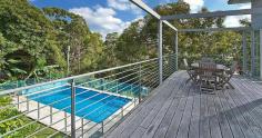  101 Woodland St S Balgowlah Heights NSW 2093 This quality architect designed home is only 6 years old and offers perfect family living on a level 730m2 block. The home has been designed to maximize the light and the vista of its leafy surrounds. The residence is set over two levels and has smart indoor/outdoor living and entertaining options connecting to the beautiful native gardens, level lawn area and the salt water swimming pool. The upper level features an expansive open plan kitchen - living - dining area that flows onto large entertaining terraces at either end of the house. The Eastern one has leafy district and water views spanning down to North Harbour while the other overlooks the impressive garden and pool. The kitchen is stunning with extensive storage space and quality European gas and electric appliances. The CaesarStone island bench allows friends somewhere to sit for a casual get together over a coffee or a glass of wine.  You won't ever feel the need to leave as upstairs has a cleverly designed home office with built-in desks, shelves and cupboards, where concealed sliding doors close off the space for complete privacy. The master suite has enough built-in wardrobe space to satisfy anyone and opens to the front terrace providing parents a quiet retreat. Upstairs also has a generous 4th bedroom with built-in wardrobe and easy access to the Western terrace.  The lower level provides a great separate zone for young children or teenagers. Two large bedrooms open out onto lush gardens with private views of the adjoining native reserve. The family room opens to the level lawn and pool area offering a superb space for children to play and party. There is also a music/yoga room and a huge laundry connecting directly to the garden and drying area. At the front of the house is a substantial storeroom to safely keep your family's bikes, surfboards and golf clubs. The location is excellent being close to local shops, schools, beaches, public transport and beautiful North Harbour. There are so many extra features that make this house stand out from the crowd that an inspection is a must if you are after a luxury home in the area. Inspect: Sat / Wed 10.15am -10.45am Auction: Saturday 18th April 2015 