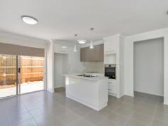  6/440 Hume Street Middle Ridge Qld 4350 Rarely do Home Units of this calibre become available - combine the Contemporary Style of a European Designer, the quality & finish of a Master Craftsman and a super convenient location. ?MasterChef? kitchen ??Smartstone? bench-top, Smeg ceramic cooktop, Bosch wall oven & Bosch dishwasher. Reverse cycle air-conditioning. Three (3) roomy bedrooms ? master with stately ensuite & spacious walk-in robe. Two other bedrooms built-in. Sparkling bathroom with separate shower and bath. Private Courtyard and secure privacy fencing. Remote panel lift garage door, security lighting and internal access from garages.  And Oh so close to Shops, Parks & Schools.  ?An address you?d be proud to call home ...  List price - $415,000 negotiable  Toowoomba is the growth capital of Queensland - with $11+ billion in Infrastructure happening in the area, excellence in clean green food, highly reputable Education facilities (University of Southern Queensland, TAFE Queensland Institute South West, many Quality Private Colleges, etc), the Service Centre for Coal Seam Gas & the Coal industries plus a strong local economy, low unemployment, extremely low vacancy (and high demand) for rental property - contact me for a full Toowoomba 'What to Buy & Where to Buy ...' Property Report to get information on what will drive the Toowoomba property market for the next 10, 20 ... 50 years.  For Sale LAST ONE - RARE Middle Ridge - Make an OFFER! Features General Features Property Type: Unit Bedrooms: 3 Bathrooms: 2 Indoor Ensuite: 1 Living Areas: 2 Toilets: 2 Broadband Internet Available Built in Wardrobes Pay TV Access Dishwasher Reverse cycle Air Conditioning Outdoor Remote Garage Secure Parking Garage Spaces: 1 Courtyard Outdoor Entertaining Area Fully Fenced 