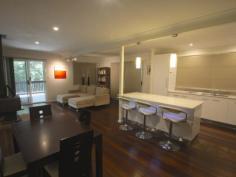  874 Terania Creek Rd Terania Creek NSW 2480 $575,000 Approximately 50 lush acres positioned 10 minutes drive from the beautiful Nightcap National Park and Protestors Falls. Recently renovated 4 bedroom home. The modern, refurbished kitchen includes a butchers bench and five burner gas stove. The kitchen opens out into an airy dining/living area that has polished timber floors and sliding doors that lead out onto beautiful, wide verandahs. There is a private, second dwelling that has been recently renovated and offers self-contained living and privacy from the main house.  Huge, undercover area that has enough room for four cars! Tastefully landscaped with a terraced vegetable garden and walking tracks that take in the large variety of fruit trees. Access to your very own, secluded swimming hole positioned on Terania Creek. Photos do not do it justice! Solar hot water, 3x 5000 gallon (total approx 60,000 litres) tanks and mains power. Phone reception and internet available. The acreage has a balance of cleared, elevated areas with views over Terania Creek Valley and beautiful, ancient stands of rainforest. There is also a second creek and dam located on the property. A school bus goes past the front gate. With so much to offer, why not inspect 