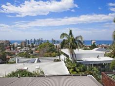  54 Quinton Rd Manly NSW 2095 Charming Residence with North East Coastal Vistas A peaceful sanctuary in a prized elevated pocket enjoying district and ocean views, this charming residence presents an excellent floor plan with 2 separate living areas and low maintenance living and entertaining. Blended with period features and modern amenities, the home has scope to further cosmetic enhancement. An open-plan kitchen at the centre of the home flows to spacious lounge and dining areas that open to a private and sunny balcony with views. With the ideal balance of open-plan and retreat-style living areas, families are free to find their own space. Accommodation is generous with 3 double bedrooms, with the master boasting king-sized proportions, sweeping views, contemporary ensuite, and a walk in robe. Enjoy a quiet and private beachside lifestyle with convenient access to Manly shops, cafes, beaches, transport & ferry.   Property Snapshot  Property Type: House Aspect Views: North East - Water Views Construction: Brick Features: Dining Room Dishwasher Ensuite Gas Rumpus Room Storage Verandah Waterview 