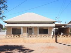  47 Harris St Broken Hill NSW 2880 Looking For The Personal Touch Looking for a good sized home in a quiet area but close to primary schools? This property offers 3 bedrooms, open plan kitchen lounge and ample storage room all on an easy care block. This home is waiting for the personal touch to compliment the pressed metal ceilings and art deco wooden doors. The three good sized bedrooms all have large windows to brighten each room and the second includes a full wall of built in cupboards. Reverse cycle air conditioning in the lounge for year round comfort but don't forget the original wood stove in the kitchen for those who love to cook on a traditional stove. For your parking convenience, there is straight through front to rear access, carport and work shed. The second toilet outside will come in handy at the house warming party.   Property Snapshot  Property Type: House Construction: Wood Iron Land Area: 414.80 m2 Features: Alarms - Smoke Alarms Ceiling Fans Rainwater Tank Robes - Built-In Robes Toilet - Additional External Toilet - Located In Bathroom Verandah - at Front Yard - Fenced 