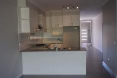  11/57 Rosemont Avenue, Bathurst, NSW 2795 $389,000 MAGNIFICENT MAGNOLIA MANORS Villa - Property ID: 786363 These brand new two bedroom villas provide lifestyle living at its finest. Superb quality finish with the following features:  - A swift two minute walk to the popular Trinity Heights shopping centre, schools, childcare facilities and hotels.  - Low maintenance, completely irrigated and landscaped yard.  - Sun drenched court yard.  - Ducted reverse cycle heating and cooling. - Ensuite off main and built-in robes throughout.  Inspection is a must to appreciate the quality of these fantastic villas.  Jaise Delaney 0424 187 786   Print Brochure Email Alerts Features  Brand New 2 bedroom Villa  Built in Robes  Low maintenance yard  Close to Schools, Shops & River Walk  High ceilings & Superb quality finishes 