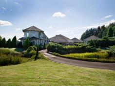  485 Range Road Mittagong NSW 2575 Bendemere 5Beds3Baths4Cars Lush 5 acres (2.25 hectares landscaped to park gardens, with sealed driveway and bridge over dam. 360 degree panoramic views to Sydney, the Blue Mountains, Appin, south towards Goulburn and west to Berrima. One of the districts highest points in one of the Highland's most prestigious streets. This private full brick and tile retreat was designed by Graeme Over, built by Turland Building Company to Engineered and Geotech specifcations in 1991, it comprises a series of five pavilions with an area od approximately 90 squares (820 square metres). Windows are laminated or toughened glass with shutters or Verasol blinds, ceilings are insulated throughout. Occupying an elite position, 'Bendemere' offers a lifestyle of elegance and retreat - on top of the world and yet minutes from Bowral and Mittagong. * Exciting architectural vision and a love of both entertaining and retreating underpin the creation of the five distinct Pavillions * Spectacular 360 degree panoramic views are framed and enhanced by parkland and woodland walks, water features and garden rooms a plenty * Indoor heated pool (12.5m), spa & sauna, Guest Pavillion with kitchenette and lounge, Chef's kitchen, gallery vestibules, stunning master suite, living rooms, heating, cooling, security, create an unrivalled atmosphere - Vast sitting room, dining room, billiard room with 11 foot ceilings, reverse cycle air conditioning and ducted Cheminee Phillipe fireplace * Large sunroom overlooking Mittagong valley with in-floor heating and opening to terrace * Spectacular master suite with underfloor heating, stunning ensuite, WIR and private courtyard * Octagonal office/studio/study upstairs with extensive views, underfloor heating and Juliet viewing balconies * Five acres of rich volcanic basalt soil, landscaped to parkland and gardens, with sealed driveway and bridge over dams * Parterre and house garden with ponds and stone walls, hillside planted for woodlands effect, with private area for picnics, quite reads or rambling walks * 360 degree panoramic views to Sydney, Blue Mountains, Appin, south towards Goulburn and west to Berrima  * One of the districts highest points enjoying one of the Highlands most prestigious addresses * Designed by Graeme Over, built by Turland Building Company to Engineered and Geotech specifications in 1991, it comprises a series of five pavillions with an area of approx. 90 squares (820 square metres) of full brick and tile construction * Dreamy gardens established with leisure in mind; woodland walks, large fox proof hen house, significant vegetable enclosure and much, much 