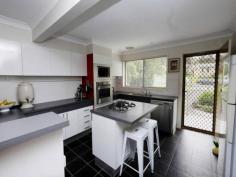  8 Gleeson Ave Forster NSW 2428 $849,000 Have you dreamt of living in paradise, with the ocean at your doorstep while you overlook tranquil park-like settings? How about wanting to be able to walk to golf or simply watch the antics from your retreat? How about having shops, parks, schools, sporting facilities etc all only a matter of a few minutes walk at best? .Dreamt of having different family dynamics under the same roof but not wanting to jeopardise space or relationships? Then read further, this home is for you!! Backing on to Forster golf course, with North One Mile beach at the end of the street, this unique home is an absolute beauty. With two separate identities under the same title, we have a 3 bedroom family home and a separate 2 bedroom villa - perfect for the family and in-laws or someone who would like to reside here but also receive an income. The upper level of this two storey family home has an open plan sunny kitchen, with plenty of bench space and storage. You can also access the sunny North facing balcony from here to sit and relax with your morning coffee. The open plan dining and living areas feature timber flooring and overlook the scenic golf course and beyond. With a beautiful balcony area positioned from these rooms, you have an ideal spot to chill out, relax and continue dreaming. The main bedroom is spacious and also enjoys the tranquil setting of the parkland golf course from both inside the room and from the balcony area, directly accessed from here as well! The lower level has a huge tiled open plan living area, currently set up as a bar/kitchen, lounge area and pool room. The 3rd bedroom is also located on this level with an accompanying ensuite. Access to beautiful lawns and the now familiar view is handy. Two separate garages increase the appeal of this property as it is a fantastic place to have a workshed and house your car. 2 x 1.5kw solar systems are installed for each property i.e. the house and the villa. The modern villa has a massive sunny main bedroom, complete with built-ins and an impressive spacious ensuite! The kitchen is extremely generous with an open plan dining and living area that captures the views from everywhere. The timber decked courtyard is an absolute treat and if you can't find solace or peace from this location, you may need some medical assistance! An automatic single lock-up door has internal access and there is also a sunroom area that would be perfect for reading, sewing or craft etc. The unique opportunity rarely comes on to the market for sale, so if it appeals to your dreams and desires, be quick! Additional features Bedrooms: 5Bathrooms: 4Ensuites: 2Garages: 3Carports: 0Secure parking: Air conditioning: 0 