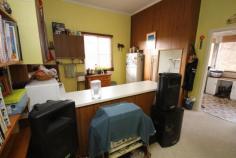  391 Rouse St Tenterfield NSW 2372 $189,000 Located opposite the town swimming pool and a short walk from shops, restaurants, medical centre and parks & sporting fields, this home has 2 large bedrooms, 3rd bedroom or office, sunroom, central lounge wood heating, kitchen looking onto the outside deck, bathroom with toilet and second toilet positioned near deck for entertaining. The large private backyard with established trees and large double carport runs down to a natural water course. A single lockable garage attached to the house provides further vehicle accommodation or workshop facilities and a storage area under house is powered. This home is currently returning $10,400 per annum. Property Features Property ID 	 8599003 Bedrooms 	 3 Bathrooms 	 1 Garage 	 3 Kitchen 	 New Stove 2011, lots of cupboard space Lounge 	 wood heater Facilities 	 New hot water system Under House 	 Good storage with power Land Size 	 2023.0 Square Mtr approx. Building Type 	 Timber/Iron Building Age 	 1960 approx Zoning 	 RU5 Village Rental Return 	 $190 Weekly Actual 
