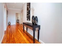  284 Northcliffe Dr Lake Heights NSW 2502 Offers Above $470,000 Enjoy entertaining in either the lounge or deck as you and your guests survey the expansive views of Lake Illawarra and the escarpment. Set on a huge block of 746 sqm and overlooking Lake Illawarra this fully refurbished 4 bedroom home is impressive. Currently returning $475.00p/w it makes for a great investment or family home to move into. Features include polished floors throughout, spacious gourmet kitchen, separate lounge & dining area opening onto balcony with lake views. 3 of the 4 bedrooms are double sized and have BIW's. 2 bathrooms, double tandem lock up garage, workshop and extra car space. Located close to schools, regional shopping centres, beaches and only a 40 minute drive from the Sutherland Shire 