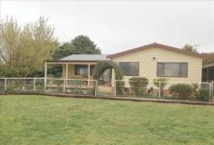  25 Turner Street Barry NSW 2799 $350,000 Country living just 10 minutes from Blayney This lovely 4 bedroom, 2 bathroom home is set on 1.75 acres in the village of Barry with beautiful rural views. The open plan kitchen, dining and family area comes complete with air conditioning and slow combustion wood heating. Outside you will find a wonderful covered entertainment area and established gardens. For the horse enthusiast you need look no further as this property comes with 2 stables, a day yard, a workshop and horse float stoage or hayshed area, lock up tack and feed shed, all with power and a rubber lined steel horse arena. Water is no problem either with 40,000lt rainwater as well as access to the community bore. Features Air conditioning Fireplace(s) Internal Laundry Bath Built in wardrobes Fully fenced Shed Dishwasher Covered entertaining area Rainwater storage tank 