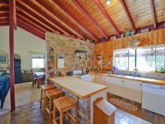 1184 Williams Rd Lillian Rock NSW 2480 OFFERS AROUND $550,000 VENDOR SAYS SELL! A one of kind, 3 bedroom besser-brick rendered home positioned on approximately 69 acres.  Functional kitchen which opens to large dining & living area. All bedrooms are generous in size and two boast built-ins. There is also a sewing room, which could be used as an office or additional bedroom. The bathroom has beautiful slate tiling and has a separate shower and bath. Throughout the home there is beautiful raked ceilings & brickwork. There are verandahs on three sides of the house that take in the spectacular rural outlook. There is a fully-fenced above-ground pool with deck, perfect for those hot summer days. There is a single garage, carport & work shed for Dad to tinker in. The acreage consists of mainly open country with good stands of timber on a high knoll. There is 2 wells which run-off into a spring-fed dam. With the school-bus running past the front gate, this property is the perfect place to raise a family. Only 15 minutes to Nimbin, 25 minutes to Kyogle and 40 minutes to Murwillumbah & Lismore 