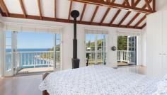  185 Whale Beach Rd Whale Beach NSW 2107 Enchanting Oceanfront Beach House with Inspiring Bay Views Built with a classic coastal ambiance and unique Caribbean style, this private residence is one of Whale Beach's best kept secrets. Set on 950sqm of oceanfront land in secluded Dolphin Bay, this is the ideal weekend 'hideaway' or family home overlooking paradise. - Incredible views from all levels into the azure waters of Dolphin Bay - Classic, refurbished timber and masonry beach house set over three levels oozing character and charm - Open plan living areas flow to a choice of sun-bathed timber decks perfect for either entertaining, or relaxing - The classic white pallet and natural timbers produce light, bright interiors with an effortless feel and provide flexibility for the modern lifestyle - Spacious country style entertainers kitchen with European appliances allows for easy entertaining overlooking the ocean - The Master bedroom is truly something special. Spacious and relaxing with high exposed beam ceiling, large private terrace and fireplace - Additional bedroom on the top floor or parents study/retreat - Two bedrooms on the lower level both with built ins, serviced by bathroom and separate WC - Featuring timber floors, two open fireplaces & large windows looking out to the ocean from all rooms - Plenty of off-street parking for four cars This rare and exclusive location combined with the classic coastal ambiance of this beach house will pull at your heart strings and have you longing for your weekend break.   Property Snapshot  Property Type: House Construction: Timber Features: Dishwasher Dryer Ensuite Gas Study Washing Machine 