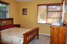  178 Mayne St Gulgong NSW 2852 $375,000 HIDING BEHIND THE TREES This quintessential family home offers an array of spectacular spaces both inside and out. The double brick rendered home is made up of 3 large bedrooms all with built in robes and ceiling fans the master also with air conditioning. The light filled country kitchen has plenty of cupboard space and offers both dine in and alfresco dining through the French doors on to the private leafy patio. The spacious living room has a real feeling of warmth and is a central hub of this family home, a formal living room or games / kids living room is adjoining.  Linked to the main house via a sun room is a neat and tidy fully self contained one bedroom granny flat with air conditioning and its own separate power meter. Boasting a 1721m2 fully fenced corner block and backing on to the Gulgong golf course gives you a real feeling of space and privacy as you only have one neighbouring property. Possible subdivision opportunity also exist subject to council approval. The established Australian native garden surrounds the home to create your own private sanctuary with multiple outdoor entertaining areas. The car is not forgotten here with a double garage and workshop plus two carports. All in all a very well presented property with lots to offer.   Inspection Times Contact agent for details Features Entertaining Area Established Gardens Rear Lane Access Built In Robes Floorboards Fully Fenced Open Fireplace Outdoor Entertaining Rumpus Room Secure Parking Shed Water Tank Workshop Land Size 1721 m2 