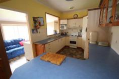  140 Miles St Tenterfield NSW 2372 $240,000 Located a short walk from Sir Henry Parkes primary school this renovated 4 bedroom family home presents well. Comprising open plan lounge and dining with wood heating, modern electric kitchen with ample cupboard and bench space, bathroom with shower and bath, second shower in the laundry, second separate toilet and rear sunroom. An outdoor entertainment area overlooks the fully fenced back yard with kid's cubby house, vehicle accommodation is provided by a single colorbond shed and carport. Mark this property as one to inspect. Property Features Property ID 	 8275343 Bedrooms 	 4 Bathrooms 	 2 2nd shower in the laundry Garage 	 2 Kitchen 	 Electric stove & range hood, good bench space Laundry 	 At rear Lounge 	 Open plan with down lights Back Yard 	 Cubby house, dog or fowl yard Close to 	 Primary School Flooring 	 Carpet & Lino Under House 	 Brick peirs Land Size 	 765.1 Square Mtr approx. Building Type 	 Timber/Iron Zoning 	 RU5 Village Floors 	 Yes Rates 	 $1900 Yearly Built In Robes 	 Yes Courtyard 	 Yes Fully Fenced 	 Yes Other Features 	 Wood Heating Outdoor Ent 	 Yes Shed 	 Yes 