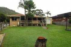  45 Koonwarra St West Haven NSW 2443 $349,000 Brick & Tile Under $350k House - Property ID: 784194 Neat three bedroom home in popular Waterveiw Heights Estate nestled at the base of North Brother Mountain. Brick and tile construction with separate lounge on entry, dining off kitchen, built-in robe in master bedroom & full length rear deck overlooking the large, fenced back yard. The property backs onto public reserve and has a single, drive through garage plus an extra detached garage & carport at rear. All in all a neat home in a lovely estate and in a price range that wont break the bank.   Print Brochure Email Alerts Features  Land Size Approx. - 669.5 m2 