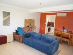  3/47-49 Hall Street Old Bar, NSW 2430 Offers Over $260,000 AWESOME BEACHSIDE LOCATION Yes, this immaculate town house is not only located 100 metres from the beach, but also has been fully renovated. This property could make a great investment or the perfect place to kick back and relax.  Featuring: * Large open plan living  * Separate eat in kitchen * Internal laundry & 2nd toilet * Ocean view balcony * Very well presented throughout * Single lock up garage * 100 metre walk to beach Don't miss this opportunity to purchase this immaculate townhouse in a fast growing area.   Property Snapshot  Property Type: Townhouse Construction: Brick Features: Balcony Built-In-Robes Storage 
