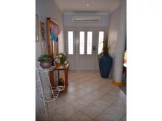  26 Williams St Temora NSW 2666 $465,000 BE SURPRISED AT THIS PEACEFUL LOCATION! Looks can be deceiving because this home has so much to offer!  So be surprised with this brick veneer home seated on 2 building blocks:  ? 4 bedrooms, all with built in robes  ? Ensuite featuring a beautiful corner bath, vanity, toilet & shower  ? Large pillars greet you as you walk into the lounge room  ? Kitchen has a lovely modern flair & storage galore, boasting gas stove, dishwasher & pantry  ? Undercover sunroom off dining area  ? Ceiling fans in bedrooms, gas heating in lounge room, reverse cycle air cond at front door  ? Main bathroom houses a bath, shower & vanity  ? Double carport adjoins the house with direct entry inside, perfect for those wet days  ? Cement driveway to the enormous back shed, perfect for the hobbyist  ? Yard is filled with gorgeous roses, yummy fruit trees and walkways meandering through this self sustainable garden So if you are looking for room to move, with the privacy you need in a peaceful area then stop looking, you will have to see to believe! Contact the friendly professional team today! For Sale $465,000 Features General Features Property Type: House Bedrooms: 4 Bathrooms: 2 Indoor Toilets: 2 Built in Wardrobes Gas Heating Split system Air Conditioning Outdoor Remote Garage Carport Spaces: 2 Outdoor Entertaining Area Shed Inspections Inspections by appointment only 