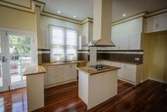  158 Marsh Street Armidale NSW 2350     $659,000   	 LOCATION - 5 minutes walk to main shopping area, central park, churches, hotels, pubs and clubs THE HOME - This heritage home comprises of 4 large bedrooms with quality carpet and all with large sliding built in wardrobes with mirrors. Three period bathrooms all with Spanish tiles and old style feature tile patterns. Claw foot bath tub in the main bathroom and exposed chrome tap ware. Contemporary kitchen with stainless steel European appliances. Solid Russian oak timber bench tops. Unique tiled splash backs with border tiles. Open living/dining and kitchen area with a blue brick entertainment feature wall and built in wood fireplace. features include *3 meter heritage plaster ceilings and walls Solid Australian Ironbark timber polished floors *Cast iron wood heater and reverse cycle air conditioning *French doors leading onto a North facing large timber deck with ornate railings *French doors and Arch window in the foyer *original weatherboards all treated painted and like new *Timber and glass windows restored to as new. *Merbou timber fencing *Large merbou timber deck with ornate handrails and balustrade THE GARAGE- Double lock up garage with a remote door that is fully lined with reclaimed blue brick corners. HERITAGE GARDENS - Victorian garden settings. *blue brick feature wall *century old hand made Turkish terracotta pickle/olive pots. *Federation era plants *Sir Walter Lawn with automatic watering system around the entire home. NO EXPENSE HAS BEEN SPARED ON THIS AMAZING RENOVATION. INSPECTION INVITED -  PRIVATE INSPECTIONS ONLY Phone: Shane: 0401653970 Arna: 0407225479 Features Fireplace Fenced Sprinkler system Safety Switch   	 Deck Low maintenance Smoke Alarms Property Details Bedrooms 		 4 Bathrooms 		 3 Ensuites 		 2 Garages 		 2 