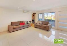  8/4-5 Dean Crescent Ermington NSW 2115 Property TypeTownhouse Fabulous Home In A Desirable Location and Views ! Locate in a quiet Cul-De-Sac within the Ermington border of West Ryde, This well maintained boutique complex is only 5 years old with a fabulous backyard for children and pets to play. Situated in a small complex of 8 townhouses this elegant home is bathed in sunshine . Master Bedroom with built ins and En-suite Stunning city & district views with only one common wall Separate living and dining with 3rd toilet  Caesar stone bench top and splash back Stainless steel gas cooking with dishwasher Internal laundry Lock up garage plus storage area Total size : 274 sqm Within walking distance to Ermington primary school, local shops, buses to Parramatta and city CBD Further information contact us Green Real Estate Agency Phone 9807 8899 (24 Hours - 7 Days a Week Open Times Saturday, 11 Apr 2015 10:00 am - 10:30 am Property Features Air ConditioningBuilt-In WardrobesClose to SchoolsClose to ShopsClose to TransportFormal LoungeGardenPolished Timber FloorSecure ParkingSeparate DiningTerrace/Balcony 
