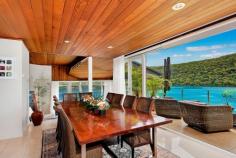  46 Cowan Drive Cottage Point NSW 2084 Price: Expressions Of Interest 1,443 sqm North Facing Deep-Waterfront Dream An exquisite connection of luxury with nature in one of only 52 private residences to exist in one of Pittwater's most exclusive waterfront enclaves which enjoys breathtaking due north facing water and unbeatable Australian bushland panorama to Looking Glass Bay and Ku-Ring-Gai Chase National Park. Cottage Point is one of Sydney's smallest yet most scenic unspoiled foreshore spots but best of all, only a 45 minute drive from your CBD office or city home. Driving distance to Terrey Hills and to Avalon shopping village and not much further Palm Beach restaurants and cafes.  An architectural triumph constructed around a spectacular natural feature rock you will soon discover a beautifully designed retreat with immense space, style and comfort. This sophisticated residence on a grand scale has it all – 5 spacious bedrooms (2 with mezzanine lofts), home office, large entertaining decks, elegant timber ceilings, formal dining and informal dining areas and that place to park the water vessel of your desire. Sea plane and ferry spotting may become one of your many favourite things to do whilst looking out from within through the double-height glass sun-soaked windows. Entertaining has never been made easier with a commercial size bar, a spectacular chef's caesar stone benchtop kitchen with Meile appliances and a dining room with romantic views on dusk which simply take your breath away. Perched on the water's edge is a self-contained boathouse with 2 loft bed areas, gas kitchen and bathroom with shower. A private deep-water jetty completes the picture.  This entire property has been meticulously renovated with updated kitchen and bathrooms, new plumbing, new electrical systems, and freshly painted both inside and out.  Features to note: - 5 bedrooms, 2 with extra mezzanine lofts - Master bedroom with ensuite, walk in robe and views - Separate formal dining and casual living areas with views - Deep 15 metre decked swimming pool, heated spa and bbq entertaining - Self-contained boathouse with bedrooms, kitchen and bathroom - Deep-water jetty , boat winch and inclinator  - Level from the street 5-car garage with internal access, plus off-street parking - Back-to-base security with ADT, reverse cycle air conditioning. The close-knit Cottage Point community mostly comprises owner-occupiers and offers a peaceful waterside lifestyle in one of Sydney's tiniest and most beautiful suburbs. For a private inspection, call Gavan Kohen on 0414 911 070. Inspection Times Or By Appointment PROPERTY OVERVIEW Property ID: 1P5814 Property Type: House Building Size: 1443 m² Carport: 5 Aspect: North FEATURES Air Conditioning Built-In Wardrobes Alarm System Pool Water Front Close to Schools Ensuite Water Views Ocean Views Security Access Security System 