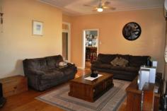  178 Mayne St Gulgong NSW 2852 $375,000 HIDING BEHIND THE TREES This quintessential family home offers an array of spectacular spaces both inside and out. The double brick rendered home is made up of 3 large bedrooms all with built in robes and ceiling fans the master also with air conditioning. The light filled country kitchen has plenty of cupboard space and offers both dine in and alfresco dining through the French doors on to the private leafy patio. The spacious living room has a real feeling of warmth and is a central hub of this family home, a formal living room or games / kids living room is adjoining.  Linked to the main house via a sun room is a neat and tidy fully self contained one bedroom granny flat with air conditioning and its own separate power meter. Boasting a 1721m2 fully fenced corner block and backing on to the Gulgong golf course gives you a real feeling of space and privacy as you only have one neighbouring property. Possible subdivision opportunity also exist subject to council approval. The established Australian native garden surrounds the home to create your own private sanctuary with multiple outdoor entertaining areas. The car is not forgotten here with a double garage and workshop plus two carports. All in all a very well presented property with lots to offer.   Inspection Times Contact agent for details Features Entertaining Area Established Gardens Rear Lane Access Built In Robes Floorboards Fully Fenced Open Fireplace Outdoor Entertaining Rumpus Room Secure Parking Shed Water Tank Workshop Land Size 1721 m2 