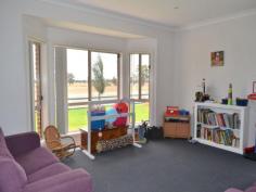  4 Kurrawong Street Temora NSW 2666 $480,000 Brick & 5 Acres Who wants the headache of Building?  Call and make appointment today to view this lovely family home, which offers a warm cosy secluded atmosphere.  The big plus is the 4 large bedrooms all with BIRs and carpeted. Main bedroom features ceiling fan and ensuite.  Kitchen has plenty of cupboard space, pantry, dishwasher and stainless steel appliances- very nice!  Laundry tiled with cupboards and folding table.  The open plan dining/ lounge room and a bonus of a secluded parents retreat, gives you two family rooms, all rooms have large windows allowing for lots of light.  Double garage with storage along on side means less clutter!  Workshop with large tank for the garden & lawn.  Paved undercover BBQ area.  Huge enclosed yard with cubby house for littlies.  Must be seen to be appreciated  Vendors realistic For Sale $480,000 Features General Features Property Type: House Bedrooms: 4 Bathrooms: 2 Land Size: 2.02ha (5.00 acres) (approx) Indoor Built in Wardrobes Dishwasher Ducted Heating Ducted Cooling Outdoor Remote Garage Secure Parking Garage Spaces: 4 Outdoor Entertaining Area Shed Fully Fenced Eco-friendly Water Tank Inspections Inspections by appointment only 