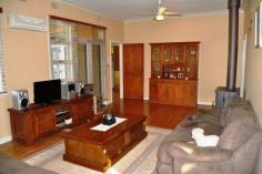  178 Mayne St Gulgong NSW 2852 $375,000 HIDING BEHIND THE TREES This quintessential family home offers an array of spectacular spaces both inside and out. The double brick rendered home is made up of 3 large bedrooms all with built in robes and ceiling fans the master also with air conditioning. The light filled country kitchen has plenty of cupboard space and offers both dine in and alfresco dining through the French doors on to the private leafy patio. The spacious living room has a real feeling of warmth and is a central hub of this family home, a formal living room or games / kids living room is adjoining.  Linked to the main house via a sun room is a neat and tidy fully self contained one bedroom granny flat with air conditioning and its own separate power meter. Boasting a 1721m2 fully fenced corner block and backing on to the Gulgong golf course gives you a real feeling of space and privacy as you only have one neighbouring property. Possible subdivision opportunity also exist subject to council approval. The established Australian native garden surrounds the home to create your own private sanctuary with multiple outdoor entertaining areas. The car is not forgotten here with a double garage and workshop plus two carports. All in all a very well presented property with lots to offer.   Inspection Times Contact agent for details Features Entertaining Area Established Gardens Rear Lane Access Built In Robes Floorboards Fully Fenced Open Fireplace Outdoor Entertaining Rumpus Room Secure Parking Shed Water Tank Workshop Land Size 1721 m2 