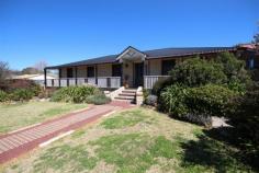  186 Pelham St Tenterfield NSW 2372 $348,000 This three bedroom home with walls in contrasting brickwork is set up to appeal to anyone, presented with excellent facilities. The lounge and bedrooms are all carpeted whilst other areas all have good quality tiling. The 3 bedrooms have built in wardrobes with the main bedroom having a large walk in robe and very large ensuite with spa bath, large shower recess and a toilet in its own cubicle. Modern kitchen with good cupboards, electric stove with range hood and dishwasher, display cupboards with leadlight doors and a family room with a wood heater, plus a formal dining room. There are quality fittings throughout and the house has a full width front verandah offering excellent views over town, plus a roofed entertainment area at the rear. To complete the property, there is a colorbond shed with remote control access. Property Features Property ID 	 11360843 Bedrooms 	 3 Bathrooms 	 2 Garage 	 2 Land Size 	 1050 Square Mtr approx. Building Type 	 Brick Zoning 	 RU5 Rates 	 $2200 Yearly Built In Robes 	 Yes Dishwasher 	 Yes Remote Garage 	 Yes Secure Parking 	 Yes Shed 	 Yes 