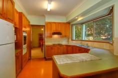  60 Greta St Gerringong NSW 2534 FOR SALE $699,000 Property Facts Property ID2842235Property TypeHouse For SalePrice$699,000Land Size1582 M2House Size-Council Rates-Water Rates-Strata Levy-Tender Date N/A Inspection Times Saturday, 11 April 201510:00AM - 10:30AM        The Family Entertainer FOR SALE $699,000 Image GalleryPrint A BrochureEmail A FriendBookmark Property More Sharing Services This huge two-storey home is a rarity with five bedrooms, three bathrooms and a multitude of living spaces perfect for the large family or those who love to entertain. Built in 1989, this family home offers nine foot ceilings with mountain views on display from both levels.  Downstairs the main lounge room features a charming open fireplace with formal dining room adjacent. Past the country-style kitchen is a second dining area, bathroom, laundry, and a large rumpus room. The entrance area offers additional storage under the stairs as well as access to a private study or office. The double garage also includes an additional workshop off the side, with internal access through to both. Upstairs a huge main bedroom with ensuite and walk-in robe is designed to take in the spectacular mountain views. Three of the four additional bedrooms contain generous built-in wardrobes and a spacious bathroom with large corner bath completes the upstairs area. Outside you will find a sizeable outdoor area off the kitchen/dining perfect for entertaining guests. The 1582 sqm block provides a generous backyard with a water tank and large storage shed, while the front garden offers privacy from the road. Situated close to the school and local cafes and shops with beautiful Boat Harbour nearby, enjoy the outlook to Wedding Cake Mountain whilst being only a couple of minutes drive from watching the waves break at Werri Beach or teeing off at the picturesque golf course 