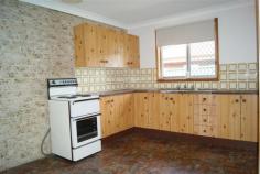 4/5 Dunlop Close Singleton NSW 2330 $169,000 GREAT PRICE UNDER $170,000!! * RESERVE OUTLOOK * LOW MAINTENANCE LIVING Tidy two bedroom end unit in a well kept complex of just 4 * quiet cul-de-sac position and adjoining and overlooks reserve * carpeted main lounge with split system air conditioner * combined kitchen and dining area * internal laundry with access to rear courtyard * main bedroom double in size with large window looking over reserve * functional bathroom * detached carport * walking distance to school, shops, RSC Club and sporting fields * low maintenance living in a small unit complex * easy renovation with quick posession available and all at a great price! Council Rates $1300 p/a Strata Levy $520 p/q 