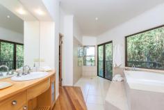  25 Azalea St Mullumbimby NSW 2482 Offers above $1,250,000 EVERY DAY IS A HOLIDAY! House - Property ID: 765664 This architect designed home has all the convenience of town with the relaxed feel of the Hinterland. Breathtaking northerly views from the Coorabell Ridge past Mount Warning to Mount Chincogan catching all the breezes and stunning sunsets. Set high in one of the best and quietest streets in Mullumbimby and surrounded by established tropical gardens with assorted fruit trees and a veggie garden on a useable 2059m2 of well planned privacy. This is a sensational home for entertaining with contemporary open plan design flooded with natural light. The covered decks lead out to the freshwater ionised pool with spa and the distant escarpment views. Quality and attention to detail are evident throughout; the double brick and hardwood construction, the grand master bedroom with floor to ceiling glass, the gourmet kitchen and the luxurious bathroom - all maximising the comfortable resort style living. Passive solar design with solar hot water and electricity and a central fireplace for winter comfort. There is a concrete triple car garage engineered to uphold the addition of an office/granny flat above (STCA).  Imagine waking up to THAT view and then marvel at your good fortune - every day can feel like a holiday!  Print Brochure Email Alerts Features  Land Size Approx. - 2059 m2 