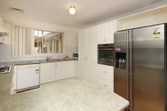  1 Collins Way Flinders NSW 2529 $679,000 SUPERB FAMILY RESIDENCE!! Immaculately presented family home in quiet location near Woodlands Estate. Within walkiing distance to beautiful parkland with ponds, playground equipment and BBQ facilities, cafes, beaches and shops. Double storey and split level design makes this property suitable for everyone. Manicured lawns and gardens are the first thing you notice upon your arrival along with beauty of the home. There are three living areas, four bedrooms with robes and the main has an ensuite, the sunny kitchen is well designed for the chef in us all, the remote double garage also has internal access into the home plus rear access to the yard. REDUCED TO SELL!!! 