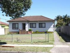  20 Dargan St Yagoona NSW 2199 Fibro Cottage on 689sqm Highly set and with great potential, this three bedroom fibro home is within a short walk to school & local shops and has potential for a duplex(subject to council approval)  Features include: *Separate lounge & dining room *Original bathroom with separate toilet *Updated kitchen *Side driveway to a good size backyard *External laundry *Land dimensions 16.15m x 42.67m= 689 sqm (approx)   Property Snapshot  Property Type: House Construction: Fibro Features: Close to schools Dining Room Lounge Polished Timber Floors 