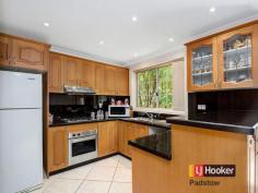  12/12 Turvey Street Padstow NSW 2211 Double Brick - Luxury & Space AUCTION: The Waratah Room, Revesby Workers Club - 2b Brett Street, Revesby REGISTRATION: From 6.00pm Quietly positioned and light filled throughout, this unique street facing double brick townhouse with its own private entry, presents an exciting opportunity for the first home buyer or investor. Boasting spacious formal and informal living areas, very well maintained interiors and secure side access to an entertainer's yard. Located only minutes to all Padstow amenities including choice of schools, shops, transport, parks and playing fields.  - 4 king sized bedrooms with built in robes + main bedroom with walk in robe & ensuite - Upstairs rumpus perfect for a kid's study area or home office  - Massive & open formal & informal lounge & dining areas  - Ducted air conditioning & vacuuming, security alarm system & down lights throughout - Timber kitchen with granite bench tops, stainless steel appliances & gas cooking  - Well maintained main bathroom tiled from floor to ceiling + separate shower & spa  - Separate internal laundry with external access + down stair's toilet for your convenience  - Entertainer's yard + automatic side access to a double carport + secure front car space - Excellent tenant of 8 years with an approximate rental return of $31,200p/a  - Minutes to all Padstow schools, shops, transport, parks and playing fields   Property Snapshot  Property Type: Townhouse 