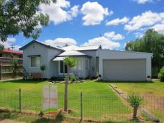  23 Bunya St Dalby QLD 4405 For Sale $258,500 Features General Features Property Type: House Bedrooms: 3 Bathrooms: 1 Land Size: 1012 m? (approx) Indoor Air Conditioning Outdoor Garage Spaces: 2 A+ option for First Home Buyers! No flood worries! Nothing else comes close for position, potential or price! Located so close to town, schools, & popular coffee shop/convenience store, you can save money & get fit by leaving the car at home more often! Your new home has been recently updated with new carpets & fresh paint externally, and features:  3 bedrooms (2 built-in robes & all with ceiling fans)  Large lounge with gas heater & air-con  Semi-mod kitchen/dining with walk-in pantry  Generous bathroom with separate shower & tub  Front sunroom + rear sitting room or office  6m x 6m garage with lights & power and remote panel door The 1012sqm (1/4-acre) block gives you plenty of room to do what you like - put up another shed or establish some gardens. The sellers have had a DA in the past for a 2 bedroom unit to be built in the back part of the block, with privacy fencing in place to suit - great potential for an added income stream in the future (STCA)! This is an opportunity you can't afford to miss, so if you're in the market for a solid home in a great position that has potential to earn you some extra $$$ in the future - make sure you book your inspection early! Energy Efficiency Rating: 0.0-star NABERS Energy Rating 