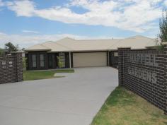  13 Chappell Close Mudgee NSW 2850 395,000 HUGE TOWN HOUSE Unit - Property ID: 763482 * Brand new 3 bedroom / 2 bathroom home * High spec finishes by Lynch Building Group * Sun-drenched North facing living area * Under roof Alfresco area flows off living * Quality stone kitchen - soft close cabinets, stainless appliances / walk-in pantry * Generous sized bedrooms with robes * Fully ducted Daikin reverse cycle air conditioning * Large linen store plus computer alcove * Peaceful South Mudgee cul-de-sac - private setting * Double garage - internal entry / remote opener * Additional visitor parking and wide turning bays * Downsize in style or invest in quality * New home government grants eligible * Potential rental income $370 P/W - Strata Fees $2000 P/A   Print Brochure Video Email Alerts Features  Built-In Wardrobes  Garden  Secure Parking 