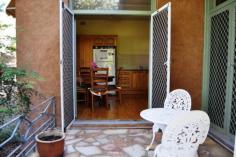  178 Mayne St Gulgong NSW 2852 $375,000 HIDING BEHIND THE TREES This quintessential family home offers an array of spectacular spaces both inside and out. The double brick rendered home is made up of 3 large bedrooms all with built in robes and ceiling fans the master also with air conditioning. The light filled country kitchen has plenty of cupboard space and offers both dine in and alfresco dining through the French doors on to the private leafy patio. The spacious living room has a real feeling of warmth and is a central hub of this family home, a formal living room or games / kids living room is adjoining.  Linked to the main house via a sun room is a neat and tidy fully self contained one bedroom granny flat with air conditioning and its own separate power meter. Boasting a 1721m2 fully fenced corner block and backing on to the Gulgong golf course gives you a real feeling of space and privacy as you only have one neighbouring property. Possible subdivision opportunity also exist subject to council approval. The established Australian native garden surrounds the home to create your own private sanctuary with multiple outdoor entertaining areas. The car is not forgotten here with a double garage and workshop plus two carports. All in all a very well presented property with lots to offer.   Inspection Times Contact agent for details Features Entertaining Area Established Gardens Rear Lane Access Built In Robes Floorboards Fully Fenced Open Fireplace Outdoor Entertaining Rumpus Room Secure Parking Shed Water Tank Workshop Land Size 1721 m2 