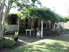  1492 Cawongla Rd Larnook NSW 2480 $745,000 Warm and inviting 3 bedroom home positioned on approximately 158 acres. Of the three bedrooms, two have doors that open onto a side verandah that takes in views of the flats and Billen Cliffs. Modern bathroom with an additional second toilet. The tidy kitchen has a walk-in pantry and opens out into a large dining area. The living area has a fire place and both this room and the study have doors that open out onto the front verandah. There is a large 3 bay machinery shed, a 2 bay car shed & 2 5000 gallon tanks. The property also boasts 1.5km of frontage onto Leicester Creek which includes some brilliant swimming holes. The acreage has the potential to run 50 breeders and is a mixture of flats and undulating timbered country. Minutes from Larnook Primary School and school buses past your front door! This property offers the perfect opportunity to raise a family in a country lifestyle whilst only being 10 minutes from Cawongla & 20 minutes from Lismore on a quiet sealed road. PROPERTY OVERVIEW Property ID:40P0848Property Type:AcreageIncluding External: 158 acres Garage:3Carport:2Construction:Timber 