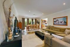  19 Tammar Pl Blackbutt NSW 2529 $749,000 EXECUTIVE RESIDENCE WITHOUT PEER!! This beautifully designed and presented family residence is majestically situated in a quiet cul-de-sac with easy access to everything that makes life so pleasurable. From the manicured lawns and gardens that surround this luxurious home to entering the front door, you are surrounded by quality and serenity. From the entry foyer you have the option to heading to any of the four huge bedrooms, each with built-in robes with an ensuite to the main and bathroom or the large spacious living and dining room as well as the gourmet style kitchen. Out the rear from this split level you have a full covered full length balcony which is private. Downstairs you have a huge rumpus room with bar, laundry, study or office which all lead onto another covered and private balcony for the entertainer. Underneath the home is a concrete floor storage area that must be seen to be believed. This immaculate property is a real must see property. 