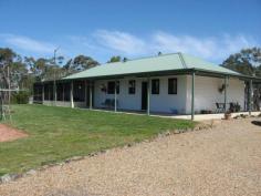  6715 Nerriga Rd Nerriga NSW 2622  $485,000 6715 Nerriga Road 	 This 45 hectare property with a modern 3 bedroom solar powered homestead can be found fronting the new main link road from Canberra to Nowra. Offering a wilderness self-contained lifestyle within reach of 3 rural town centreâ€™s an hour or less away. Enjoy the views of the distant ranges, bush land and pasture from the country verandahs of the home. - Ranch style 3 bedroom homestead - 45 hectares of excellent idyllic bush land - Around 16 hectares of pasture with dam - Self-contained solar system and water storage Property Details Property Type: 	 Rural Bedrooms: 	 3 Bathrooms: 	 2 Garages: 	 2 Land Area: 	 45ha 