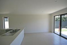  22/44-48 Elanora Avenue Pottsville NSW 2489 $449,000 100 metres to the beach - Open Saturday Townhouse - Property ID: 761794 SAVE $5,000.00 WITH THE GOVERNMENT'S NEW HOME SCHEME.  The walk to the beach from this location is so close that you could nip back for the sunscreen if you leave it behind.  Swim, surf, fish, play ... enjoy the beach lifestyle from this smart, crisp brand new townhouse. DOWNSTAIRS: *Spacious open plan, kitchen, dining & lounge room design *Powder room with toilet *Covered front entry *Fully fenced and gated yard *Laundry  *Single lock-up garage with internal access *Loads of storage cupboards UPSTAIRS: *2 guest bedrooms all with built in robes *Master bedroom with ensuite bathroom,Slider robe and verandah *Family bathroom with shower plus bath *Verandah off second bedroom Body Corp $40.00 per week only - Pet friendly Make the seachange today or use as your holiday destination/ weekend retreat.  Discover Pottsville Beach, an idyllic township where the country meets the coast. Embrace a true community with it's relaxed lifestyle and unspoilt natural beauty. 20 mins drive to Gold Coast airport and 30 mins to Byron Bay.  Print Brochure Email Alerts Features  Last newly built & affordable  Very spacious & loads of storage  Quality build & Inclusions  2 verandahs upstairs  Walk to beach & all amenities including school  Don't miss out 