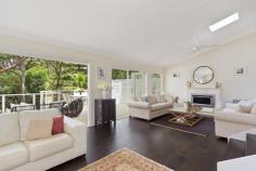  62 Ronald Ave Greenwich NSW 2065 Stunning Family Home - Impeccably Designed Stunning family home that could be straight out of ‘Home Beautiful’ magazine. Fall in love with this exceptional residence.  Enjoy the peaceful and tranquil setting overlooking terraced gardens with a breathtaking bushland backdrop.  Newly renovated throughout to the highest of standards providing the ultimate in relaxed living. Warmth, space, style, light, ample storage and fitted cabinetry throughout – impeccably designed. Sophisticated living areas combine style and practicality – an effortless home flows onto a large, partly covered deck overlooking the stunning terraced gardens. Expansive, sleek, gourmet kitchen with caesarstone benchtops and european appliances. Beautiful, light-filled airy master bedroom with huge ensuite – ‘his & hers’ basins, marble vanity, bath & shower with travertine stone tiles. Main bathroom with freestanding bath, shower and caesarstone vanity. Easy access to bus route to ferry and a stroll to Pacific Highway and Greenwich Primary School. Walking distance to St Leonards Station. Features Polished oak floorboards throughout Spacious internal laundry / linen storage Underfloor heating Built-in wardrobes Plantation shutters Gas fireplace Landscaped gardens Double lock-up garage Huge under-garage storage Brand-new ‘Cyclone’ spa pool with built-in deck seating 