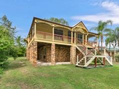  20 Fernvale Rd Brassall QLD 4305 Double the Home – 4,123 m² and a Shed This huge property has loads of potential for the right buyer. Sitting in a high position to catch the beezes, this Queenslander has been raised and built in under to give you double the living space. Keeping with tradition upstairs the home features high ceilings, VJ walls and gleaming polished floors throughout the open plan design living areas. There are two huge bedrooms with French doors opening onto the verandah. The formal dining room also has french doors opening to a private balcony where you can relax and absorb the beautiful tranquil setting. A solid timber kitchen is perfect for the gourmet chef with ample bench space and an island bench for food preparation. Downstairs has been built in to give you an extra living area and another 3 huge bedrooms, a second bathroom, large lounge room and internal access from the double garage. There is also a double lock-up shed for “the boy toys” complete with power. The property also has the shell for an in-ground pool – currently emptied and not functional 