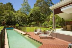  16 Panorama Rd Bundanoon NSW 2578 Private Oasis In Bundanoon House - Property ID: 777619 PRICE GUIDE $699,000-799,000 WATCH THE FULL HD MOVIE ON DOMAIN,REAL ESTATE.COM OR PROFESSIONALS SOUTHERN HIGHLANDS WEBSITE A peaceful private haven set amongst mature landscaped low maintenance gardens, this quality modern contemporary split level home is situated in one of the best addresses in Bundanoon. The sweeping tree lined driveway swings round to showcase this elevated family home which overlooks the 16 metre lap pool and gentle, manicured gardens. This home is an entertainer's delight with its spacious open plan kitchen, dining and living room that leads onto the tiled alfresco deck. The surround sound music system is also piped through to the alfresco area and pool. The designer kitchen has soft close cupboards and doors, caesarstone bench tops, modern European appliances and is the light filled hub of the home. A generous laundry/utility room is situated off the kitchen with another toilet. A separate study area leads off to the 4 generous light-filled bedrooms. The master and guest bedroom both boast walk in robes and generous modern ensuites. The master has it's own private balcony overlooking the gardens. The 2 remaining double bedrooms are serviced by the generous family bathroom. Zoned under floor heating throughout this home keeps you beautifully warm and the gas open fireplace in the living area adds to the ambiance. Set on 3,081 square metres of private gardens this oasis is sure to please even the most discerning buyer. Quality, style, position and privacy ...this home has got it all.   Video Email Alerts Features  Land Size Approx. - 3081 m2 