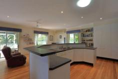  14 River Gum Cl Mooloolah Valley QLD 4553 599000 Set on a beautifully manicured 3472m2 block and only a 10 minute walk to the centre of Mooloolah Valley is this lovely family home. Positioned on top of the hill with views over the valley.  Featuring:  Elevated family home with lovely views Polished timber floors through out 4 spacious bedrooms, master with ensuite & walk in robe Large central kitchen with gas stove  Open plan living with split system air-conditioning Living area opens to the undercover veranda overlooking the  Sparkling in-ground swimming pool  Large internal garage 6m x 7m with extra high ceilings & remote entry Beautiful easycare manicured gardens Easy access with a bitumen driveway Fully fenced yard at the back of the home  This property is lovely and well worth an inpection today. Outdoor entertainment areaIn-ground poolLow maintenanceUndercover outdoor areaGas stoveOvenDishwasherGas hot water systemCeiling fansAir conditioning Bedrooms 		 4 Bathrooms 		 1 Ensuites 		 1 Garages 		 2 Land Area 		 3472 m2 