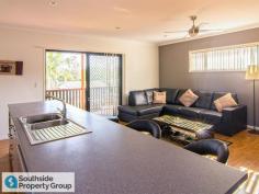  32 Heaton Street Rocklea Qld 4106 Wow! A near new four bedroom, two bathroom home within 11km of the CBD at this price? Yes, but you will have to act quickly. This home has so much to offer and will not break the bank. Situated on an easy to maintain 405sqm block, this affordable high set is a quick stroll away from Rocklea Railway Station giving you quick and easy access to the city. Upstairs; *  Four spacious bedrooms all with built ins and ceiling fans *  Master bedroom has ensuite and reverse cycle air conditioning *  Large lounge opening out to the rear with an under covered balcony *  Gallery kitchen comprising of plenty of cupboard space, stainless steel appliances with extra large oven, 5 burner gas cook top and dishwasher *  Floating timber floors throughout living areas and hallway with quality carpets to the bedrooms *  Fly screens throughout *  Downlights throughout *  Touch pad back to base security alarm system *  An area at the top of the stairs that could be utilised as a study nook Downstairs; *  Double remote lock up garage *  Storage under stairs *  An area to the rear of the garage that could be concreted, battened off and used as a massive entertaining area or general storage *  5000 ltr water tank *  Full fenced and lockable back yard which makes it child and pet friendly This property is priced to sell at the best offer over $450,000 and believe me there is a lot of house here for your buck. 