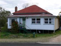  16 White St Stanthorpe QLD 4380 $155,000 • 	 This property has been partially renovated and just needs to be finished off • 	 Internally the house has been opened up to create a large lounge, dining and kitchen area • 	 There is a new kitchen with large storage cupboards and Caesarstone bench tops • 	 The kitchen includes a new 900 wide free standing electric oven with a 5 burner gas cook top and dishwasher • 	 The master bedroom has a walk in rode and there is the potential to add additional bedrooms • 	 The home is situated in a quiet street in sought after location, on a large 1012 m2 block of land • 	 Outside the rear of the house is a large covered entertaining area and car port, with 2 small garden sheds • 	 The back yard has a vegetable patch with plenty of room to establish gardens among some lovely granite rock formation Category House Property ID H2931 Land 1012 Sq m 