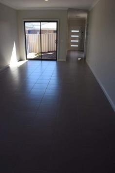  11/57 Rosemont Avenue, Bathurst, NSW 2795 $389,000 MAGNIFICENT MAGNOLIA MANORS Villa - Property ID: 786363 These brand new two bedroom villas provide lifestyle living at its finest. Superb quality finish with the following features:  - A swift two minute walk to the popular Trinity Heights shopping centre, schools, childcare facilities and hotels.  - Low maintenance, completely irrigated and landscaped yard.  - Sun drenched court yard.  - Ducted reverse cycle heating and cooling. - Ensuite off main and built-in robes throughout.  Inspection is a must to appreciate the quality of these fantastic villas.  Jaise Delaney 0424 187 786   Print Brochure Email Alerts Features  Brand New 2 bedroom Villa  Built in Robes  Low maintenance yard  Close to Schools, Shops & River Walk  High ceilings & Superb quality finishes 